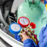 technician-check-car-air-conditioning-system-refrigerant-recharge-repairman-holding-monitor-tool-check-fixed-car-air-conditioner-system-air-conditioning-repair-min-scaled.jpg